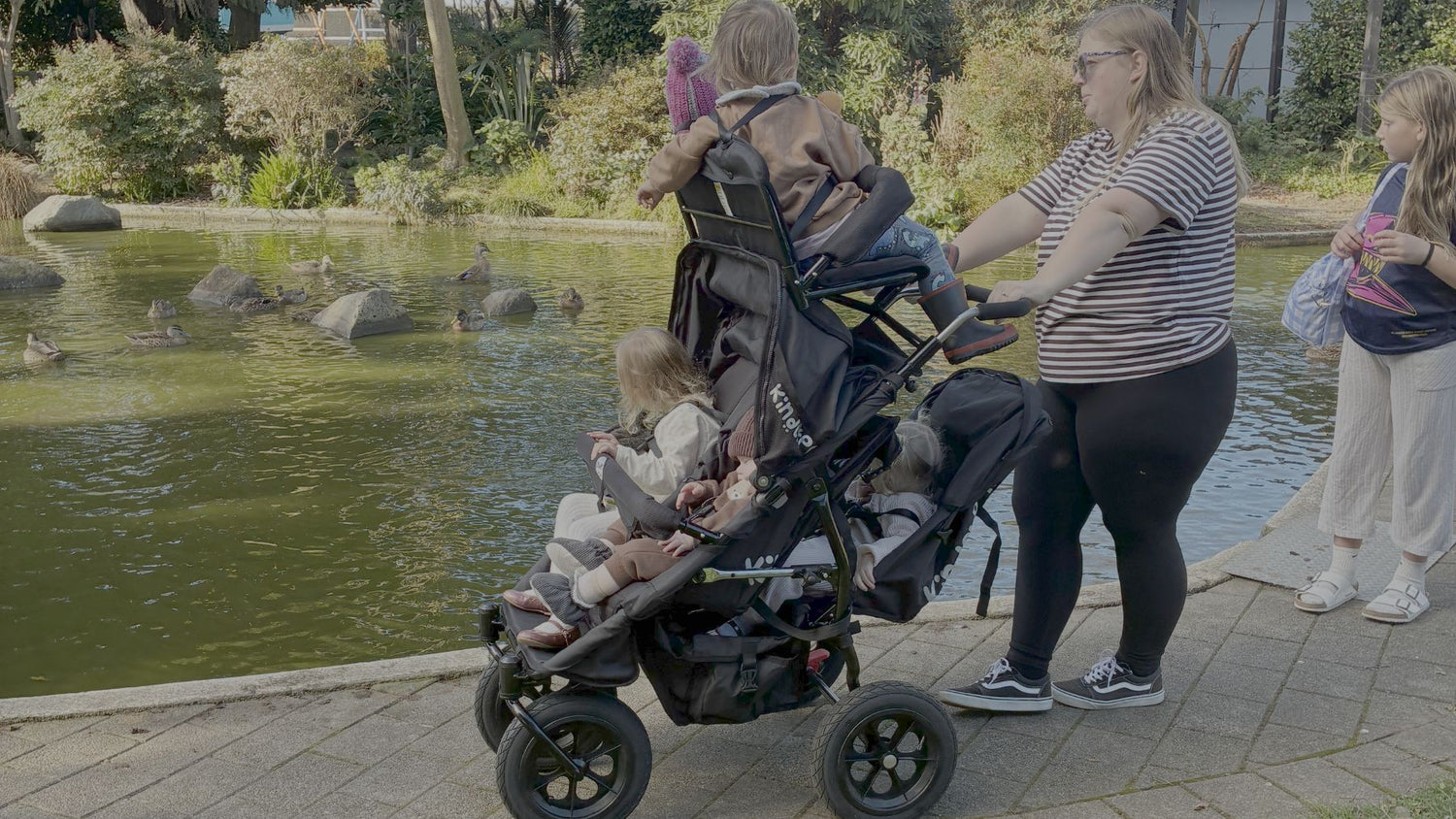How can I safely walk multiple children at once?